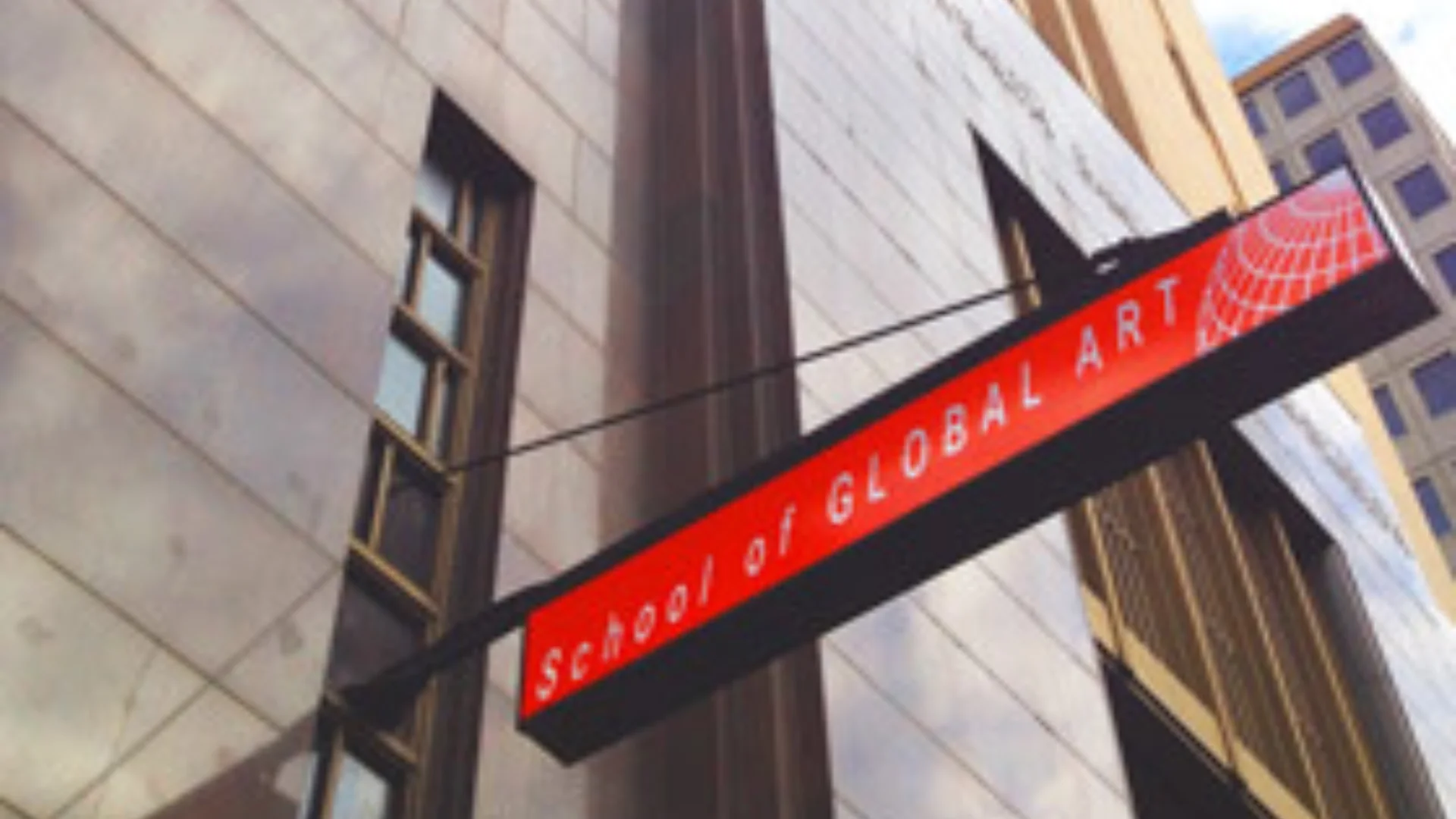 Building with red angular sign