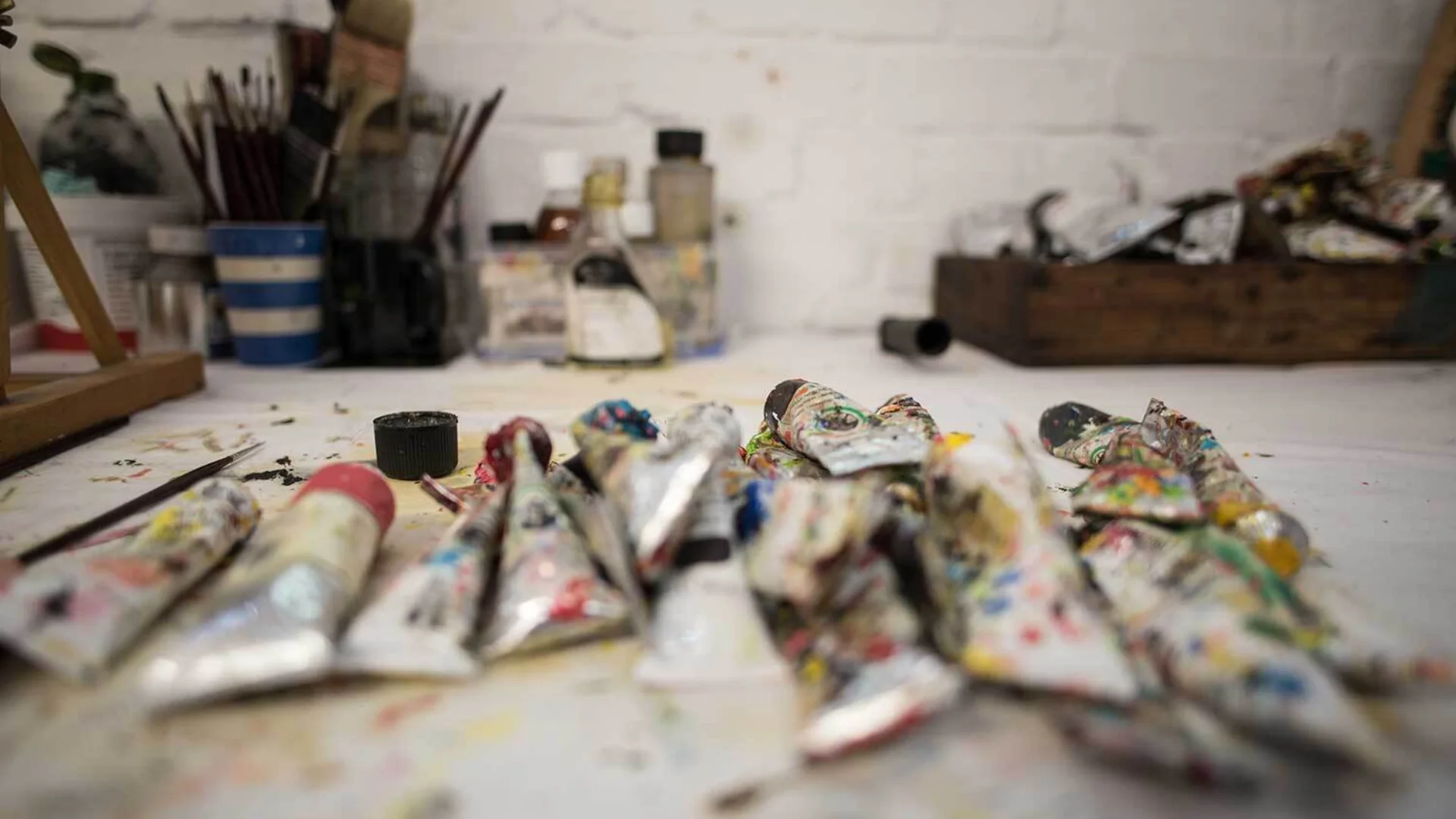 Paint tubes on table