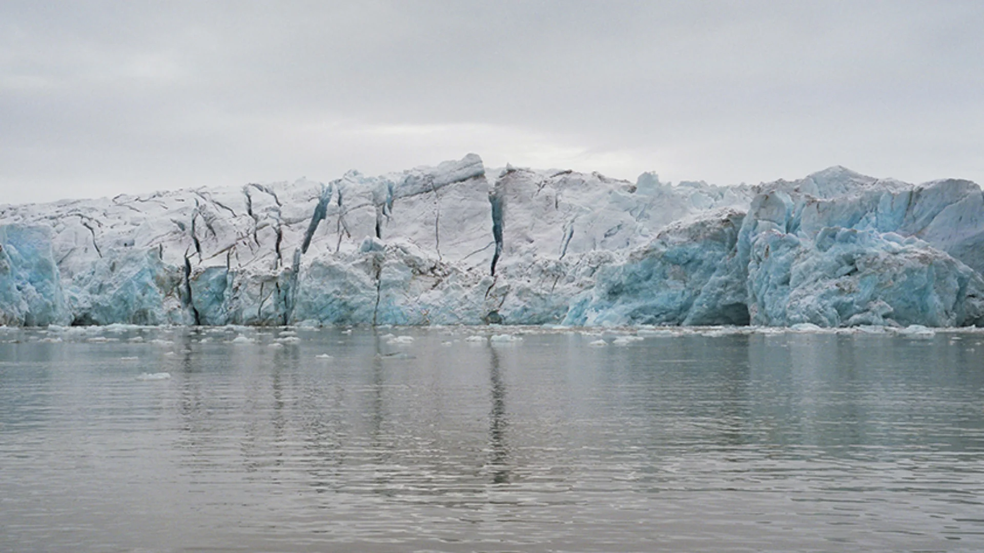 Cracked Iceberg reflected in the sea