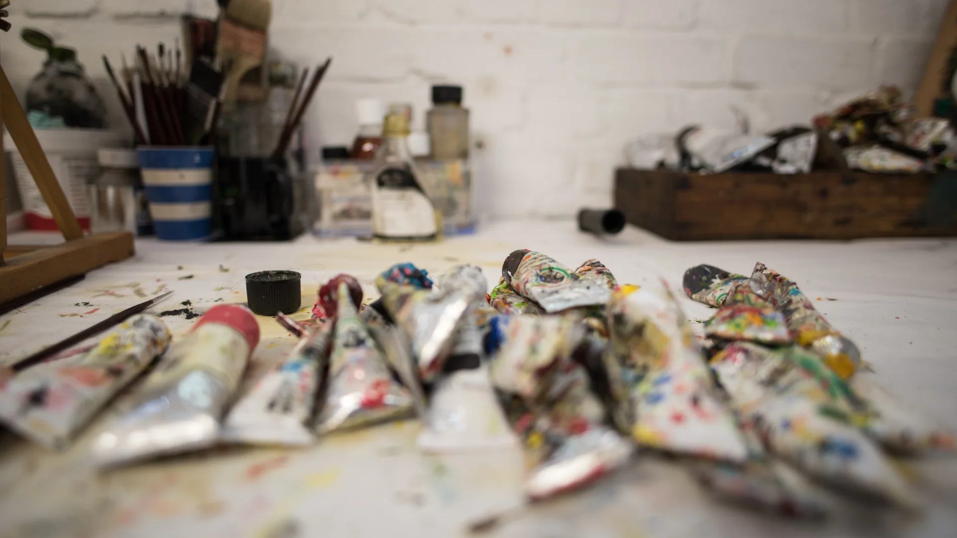 Paint tubes laid on a table