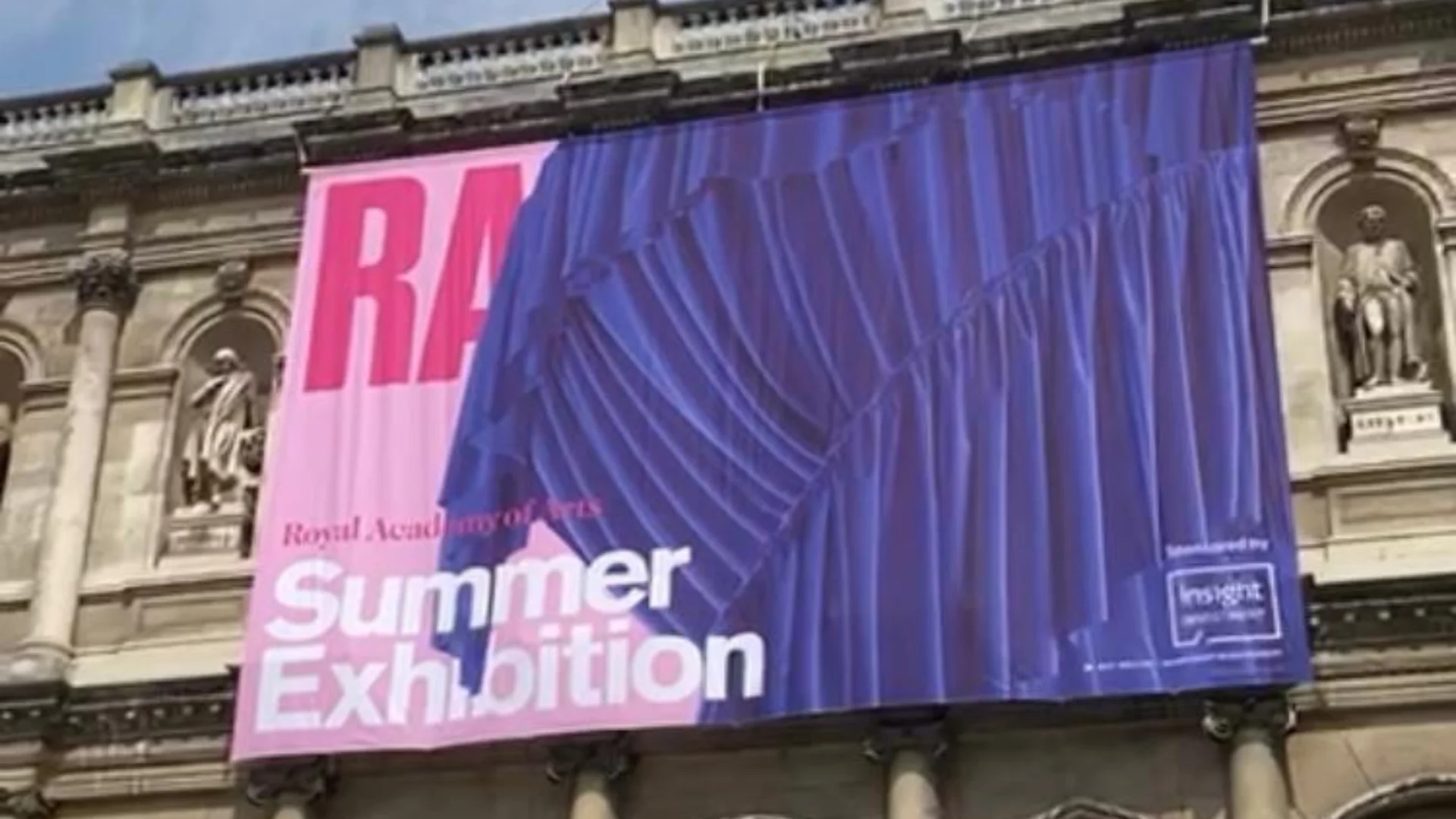 Summer Exhibition Sign hanging from front of Royal Academy building.
