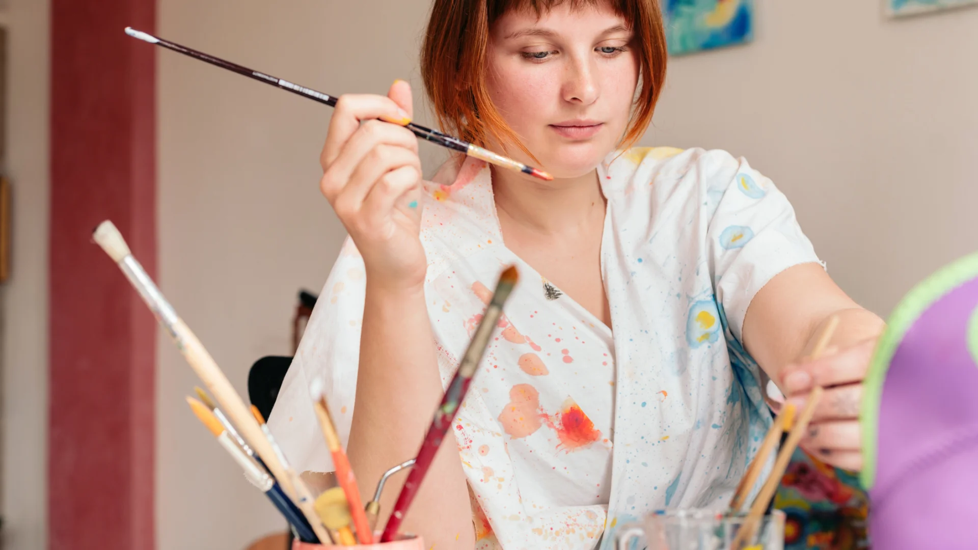 Artist holding paint brush