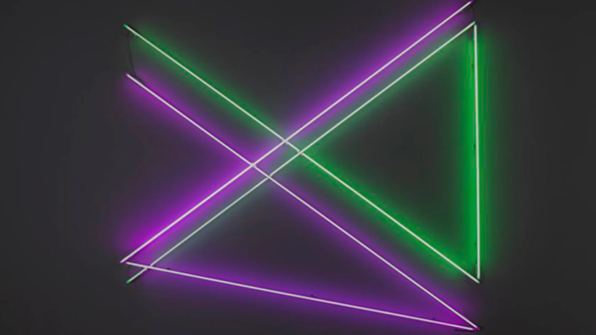 Green and Purple lines zig zagging across a black background